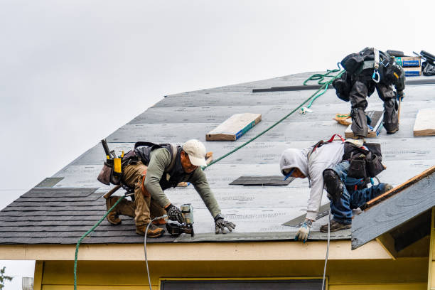 Professional Roofing technician working in Saint James, NY